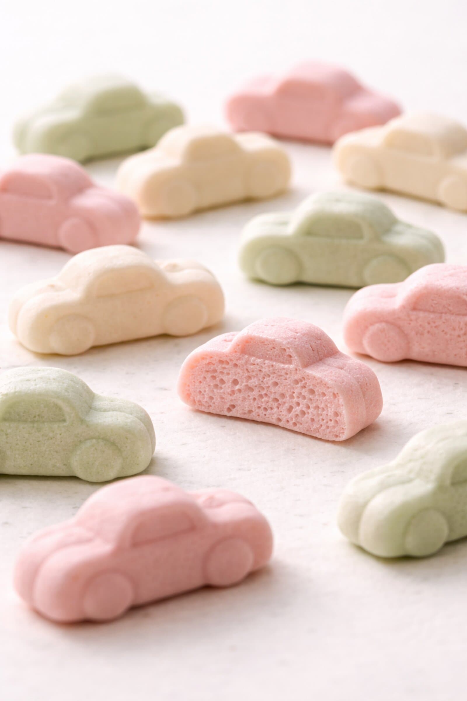 Ahlgrens Bilar candy cars in pink, green, and white